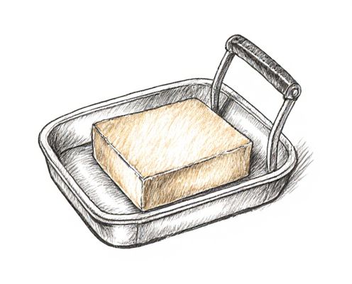 Tofu Press in Kitchenware: Enhancing Texture for Women's Plant-Based Cooking